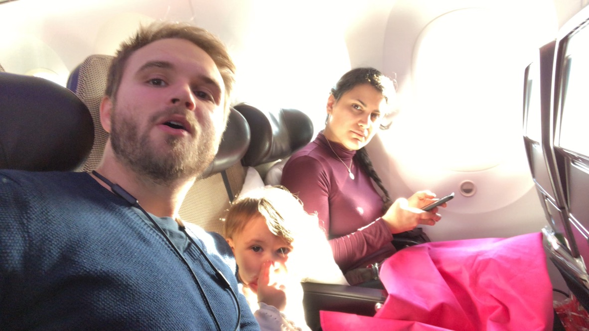 Family on Airplane Flight
