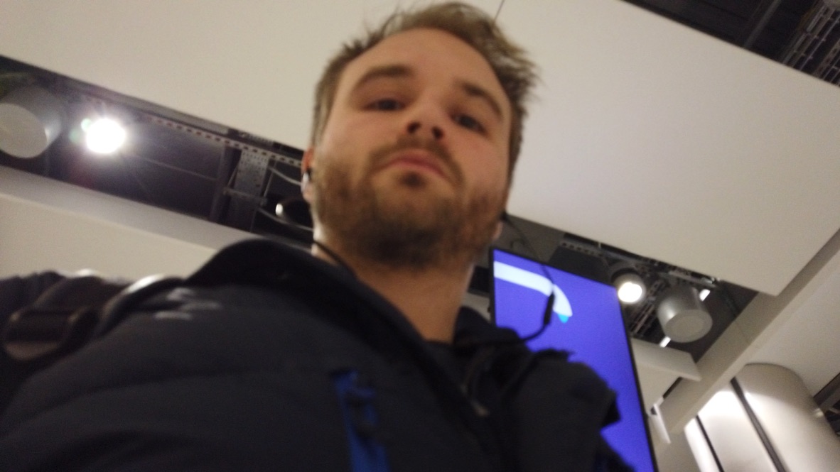Self-Portrait of a Man with Beard in Modern Indoor Setting