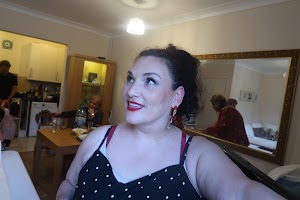 Woman Taking Selfie in Home Dining Room