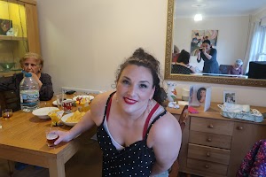 Woman Posing at Family Gathering