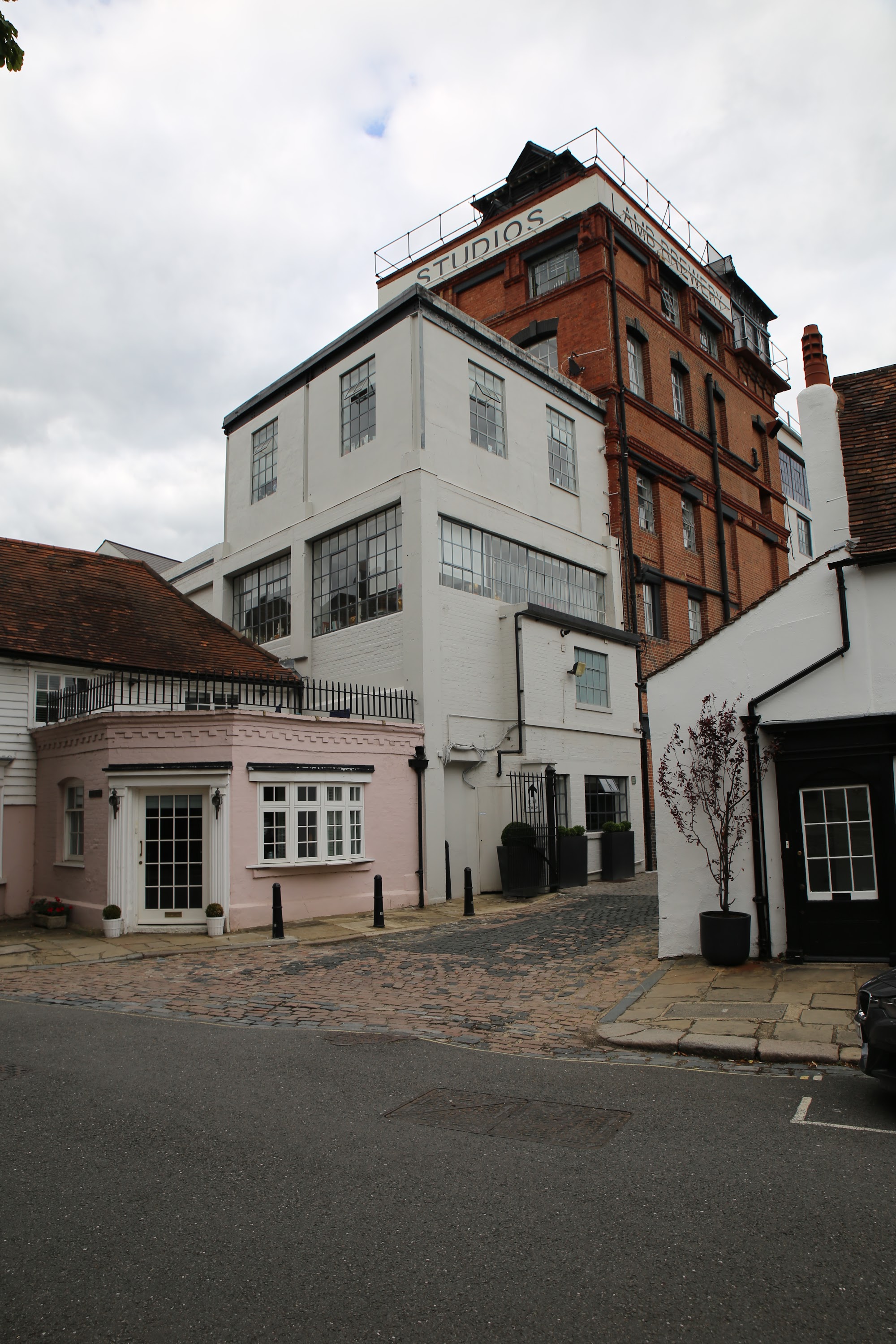 Historic Studios Building and Cobblestone Alleyway