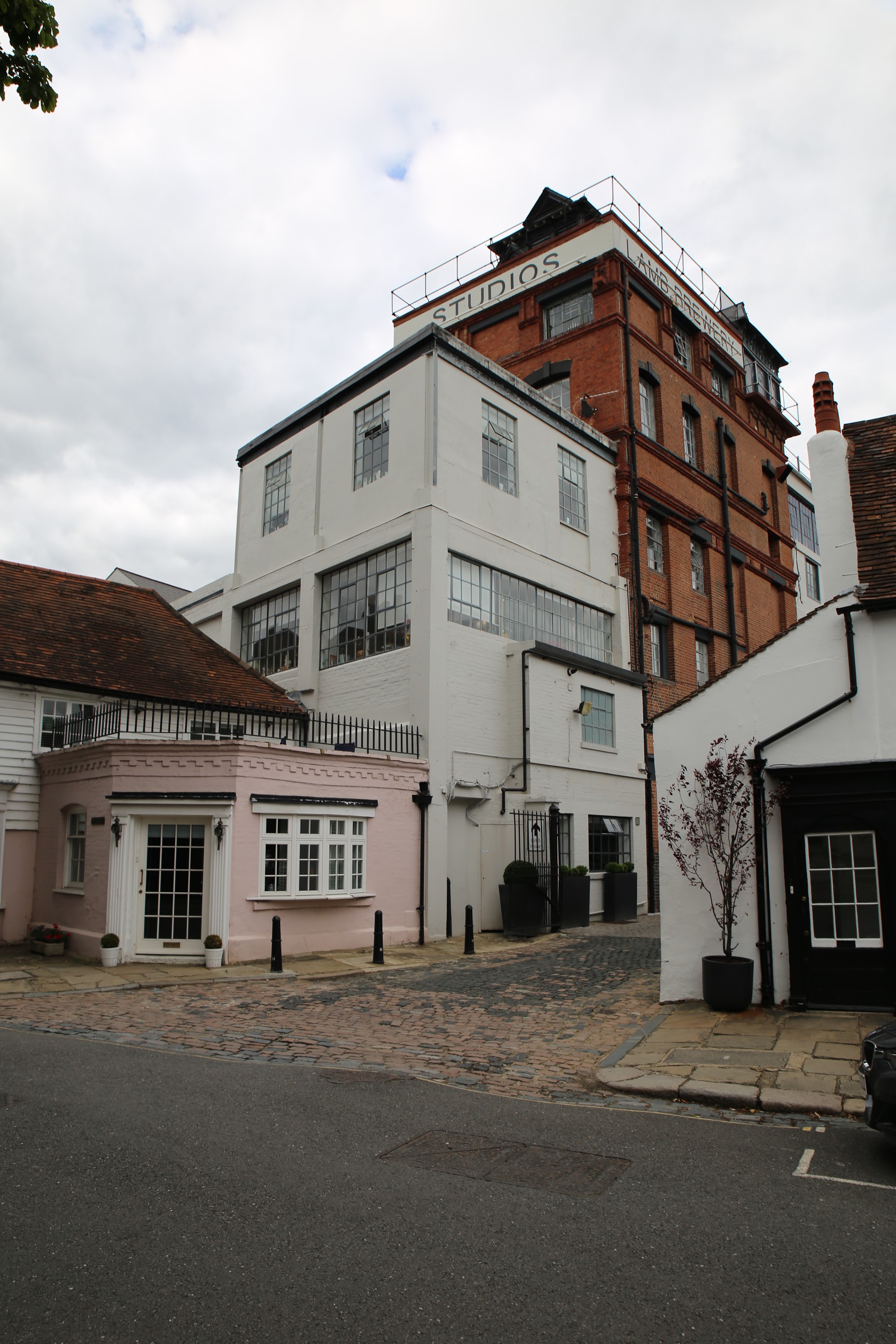 Vintage Studios Building with Cobblestone Street
