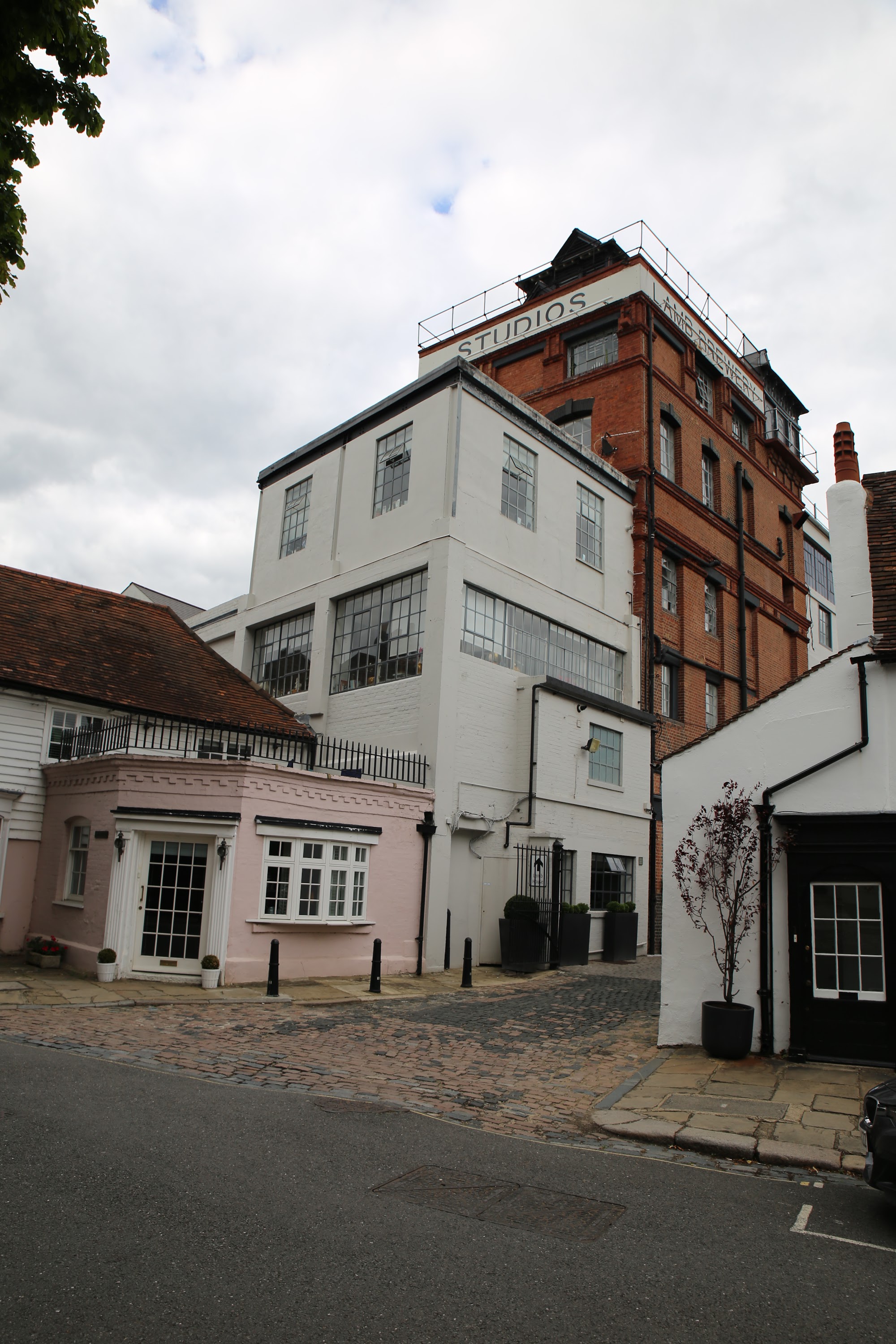 Historic Studios Building and Cobblestone Alleyway