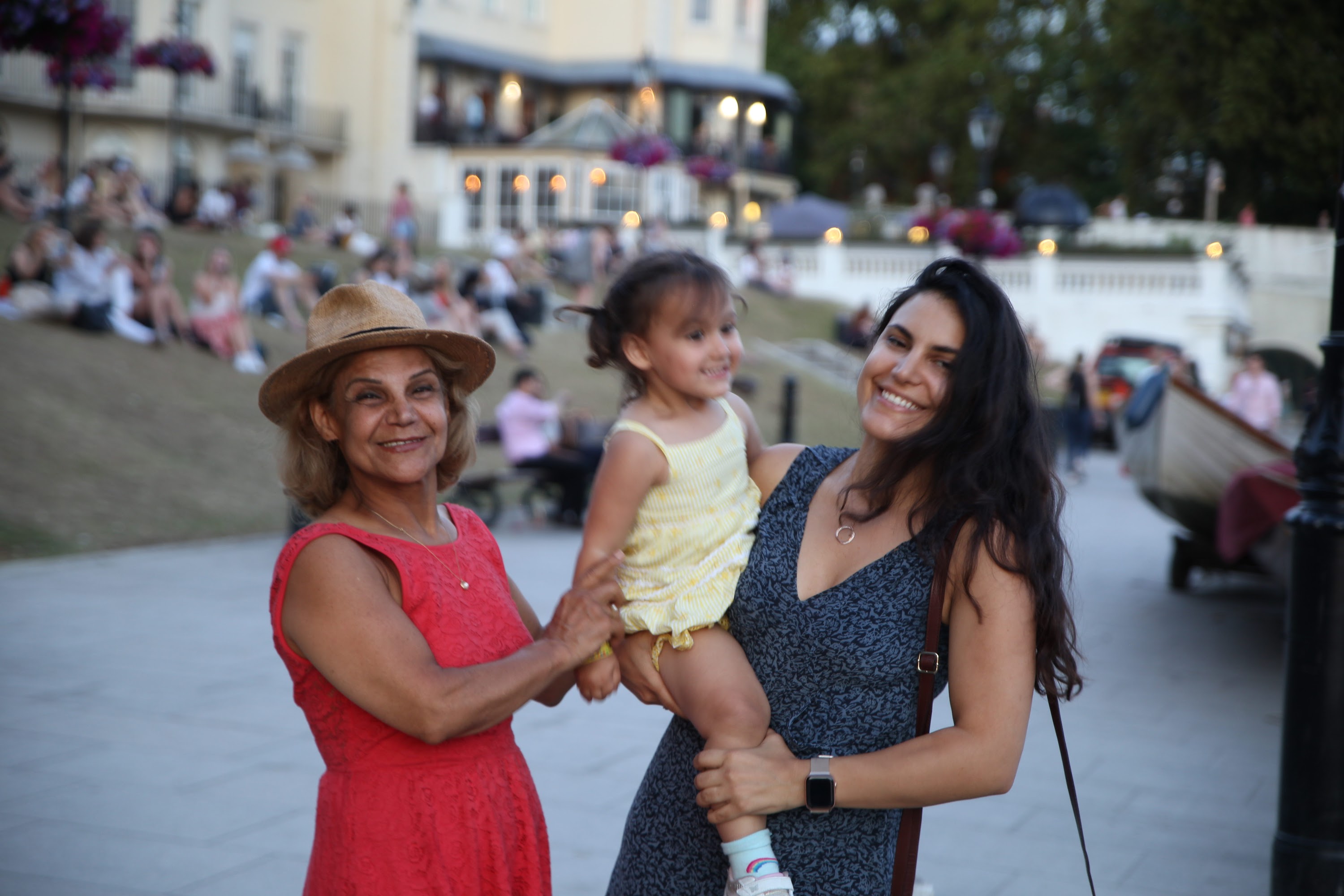 Three Generations of Women Outdoors at Dusk