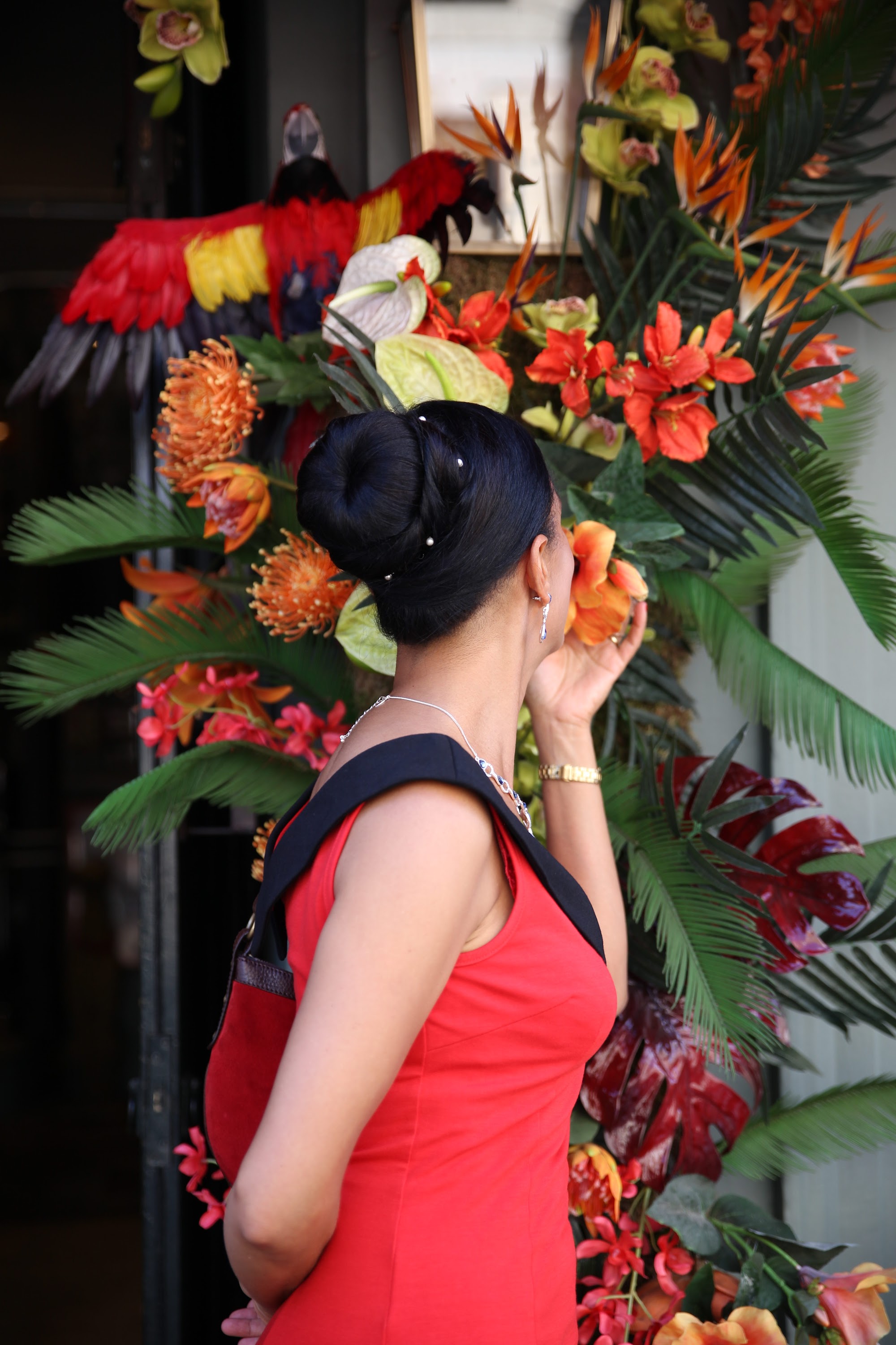 Woman in Red Dress on Historic London Shopping Lane
