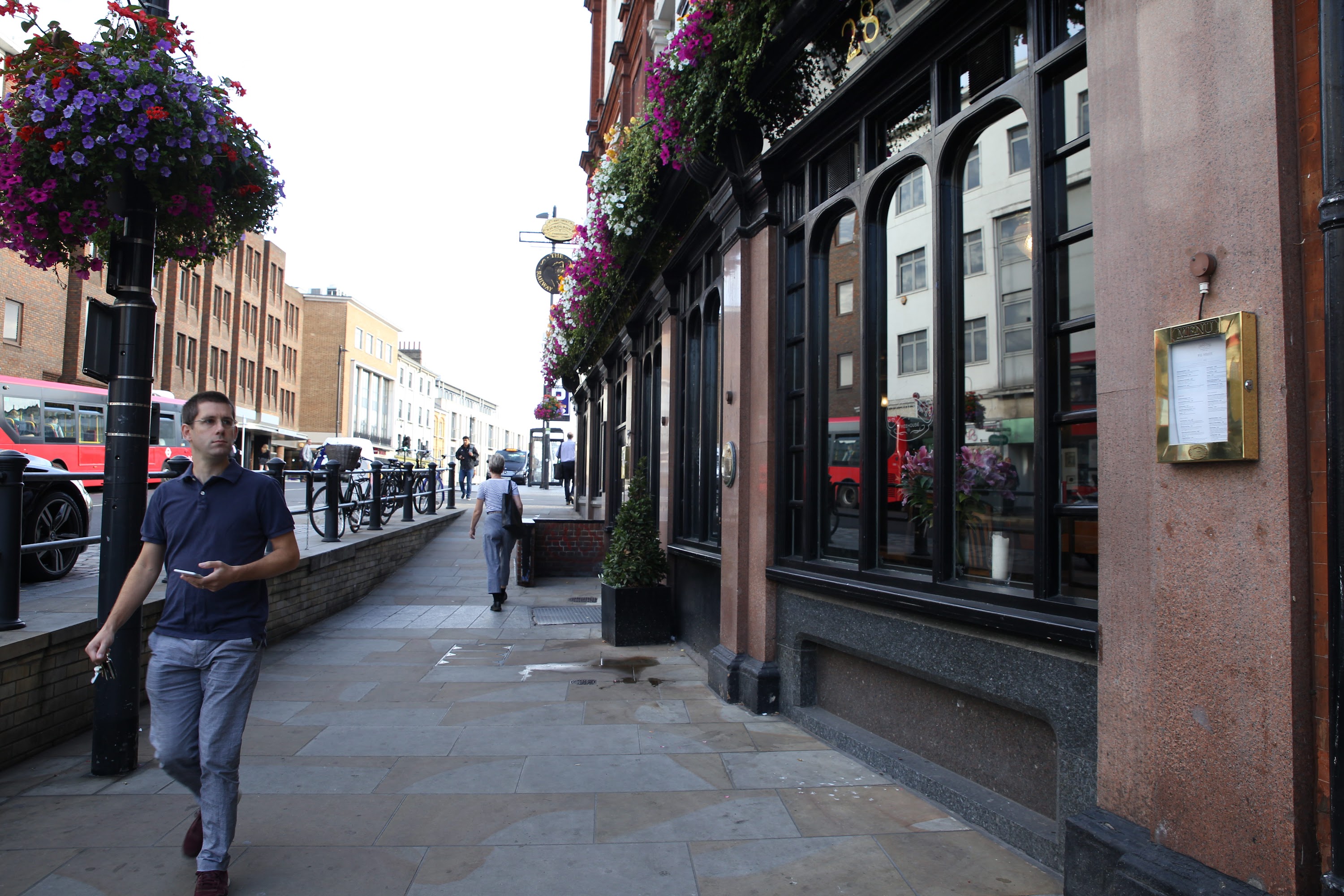 Street Scene with Pub and Flower-Bedecked Lamppost