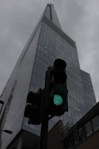 Green Traffic Light with The Shard in Background