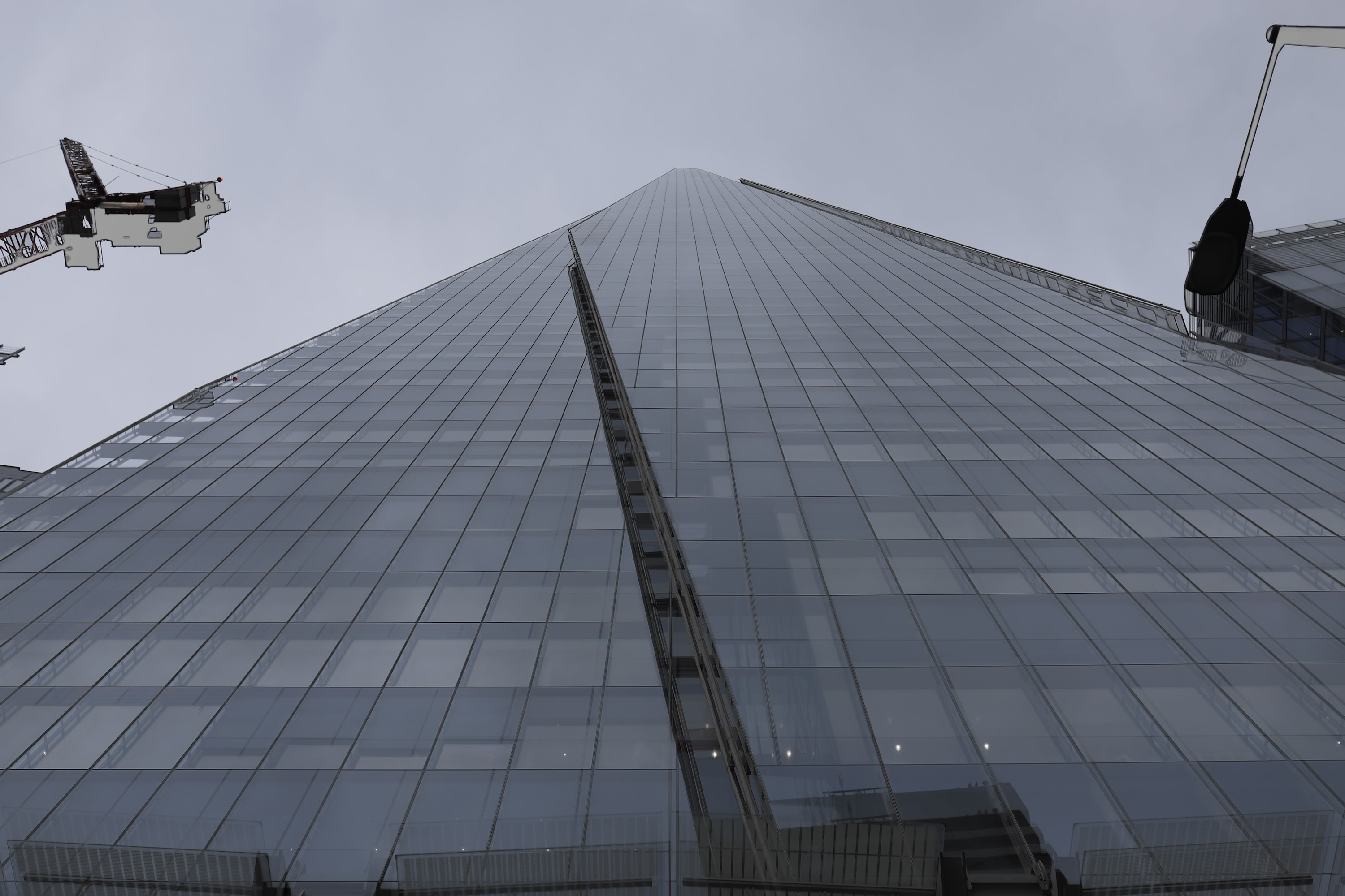 The Shard skyscraper under construction with cranes