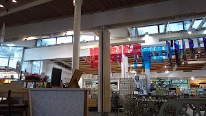 Café Seating Area Inside a Specialty Food Market