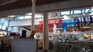 Café Seating Area Inside a Specialty Food Market