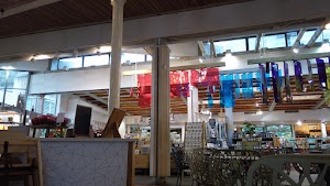 Café Seating Area Inside a Specialty Food Market