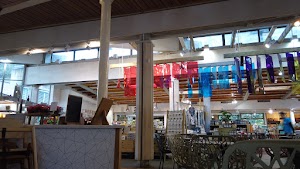 Café Seating Area Inside a Specialty Food Market