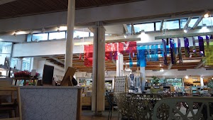 Café Seating Area Inside a Specialty Food Market