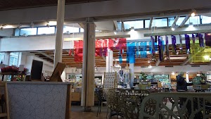 Café Seating Area Inside a Specialty Food Market