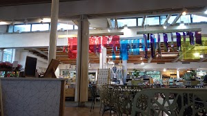 Café Seating Area Inside a Specialty Food Market