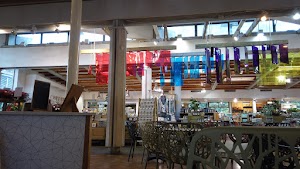 Café Seating Area Inside a Specialty Food Market