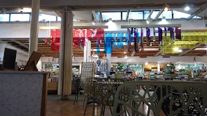 Café Seating Area Inside a Specialty Food Market