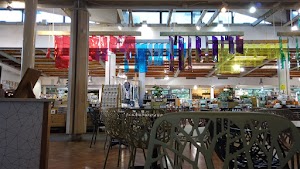 Café Seating Area Inside a Specialty Food Market