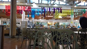 Café Seating Area Inside a Specialty Food Market