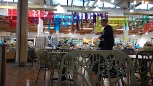 Café Seating Area Inside a Specialty Food Market
