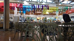 Café Seating Area Inside a Specialty Food Market