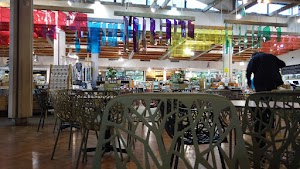 Café Seating Area Inside a Specialty Food Market