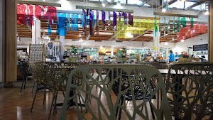 Café Seating Area Inside a Specialty Food Market