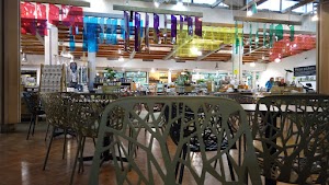 Café Seating Area Inside a Specialty Food Market