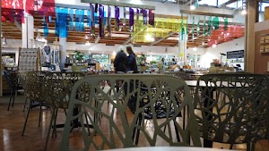 Café Seating Area Inside a Specialty Food Market
