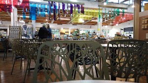 Café Seating Area Inside a Specialty Food Market