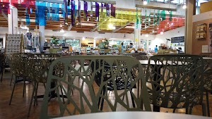 Café Seating Area Inside a Specialty Food Market