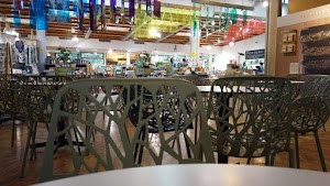 Café Seating Area Inside a Specialty Food Market