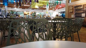 Café Seating Area Inside a Specialty Food Market