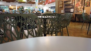 Café Seating Area Inside a Specialty Food Market