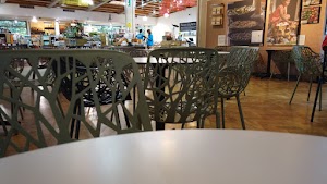 Café Seating Area Inside a Specialty Food Market