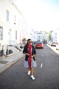 Street Fashion Portrait in Front of Blue London Townhouse