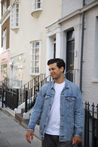 Young Man with Bicycle on Notting Hill Street