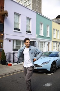 Young Man with Bicycle on Notting Hill Street