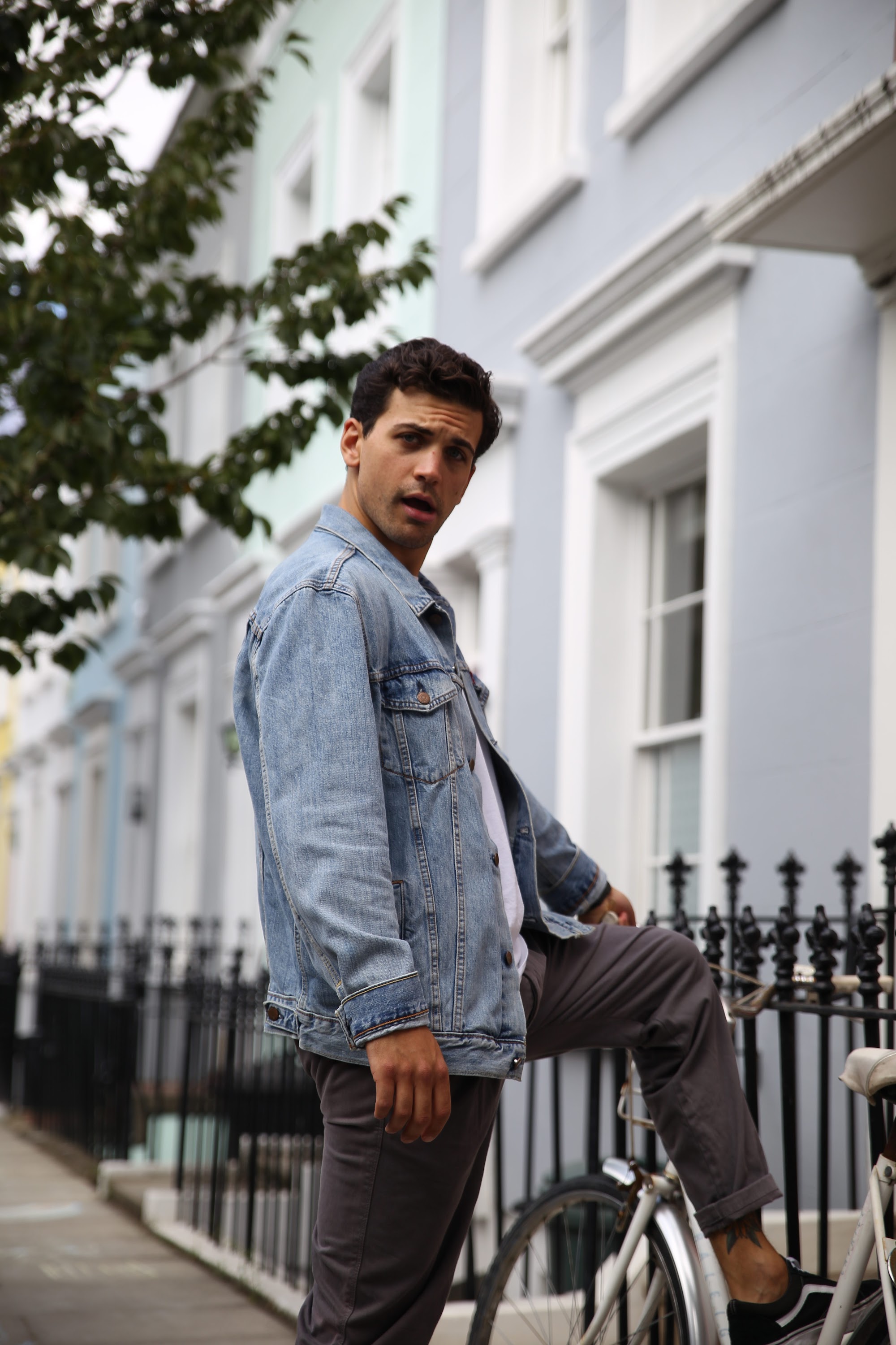 Young Man with Bicycle on Notting Hill Street