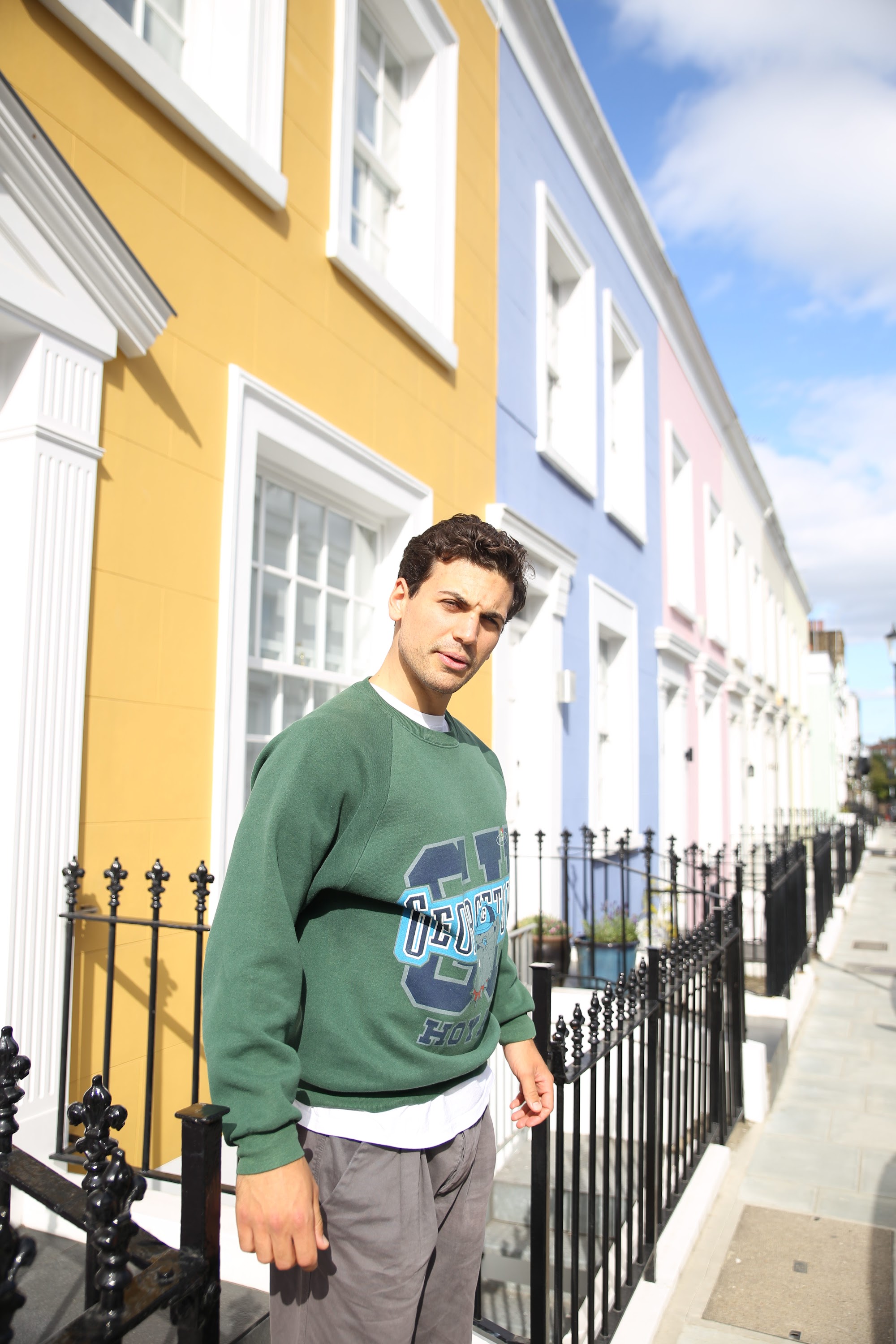 Young Man with Bicycle on Notting Hill Street