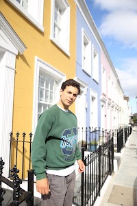 Young Man with Bicycle on Notting Hill Street