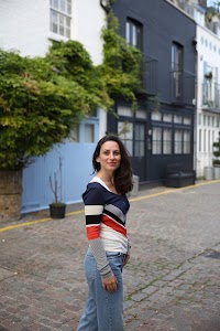 Woman Laughing on London Residential Street