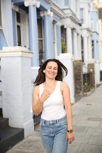 Woman Laughing on London Residential Street