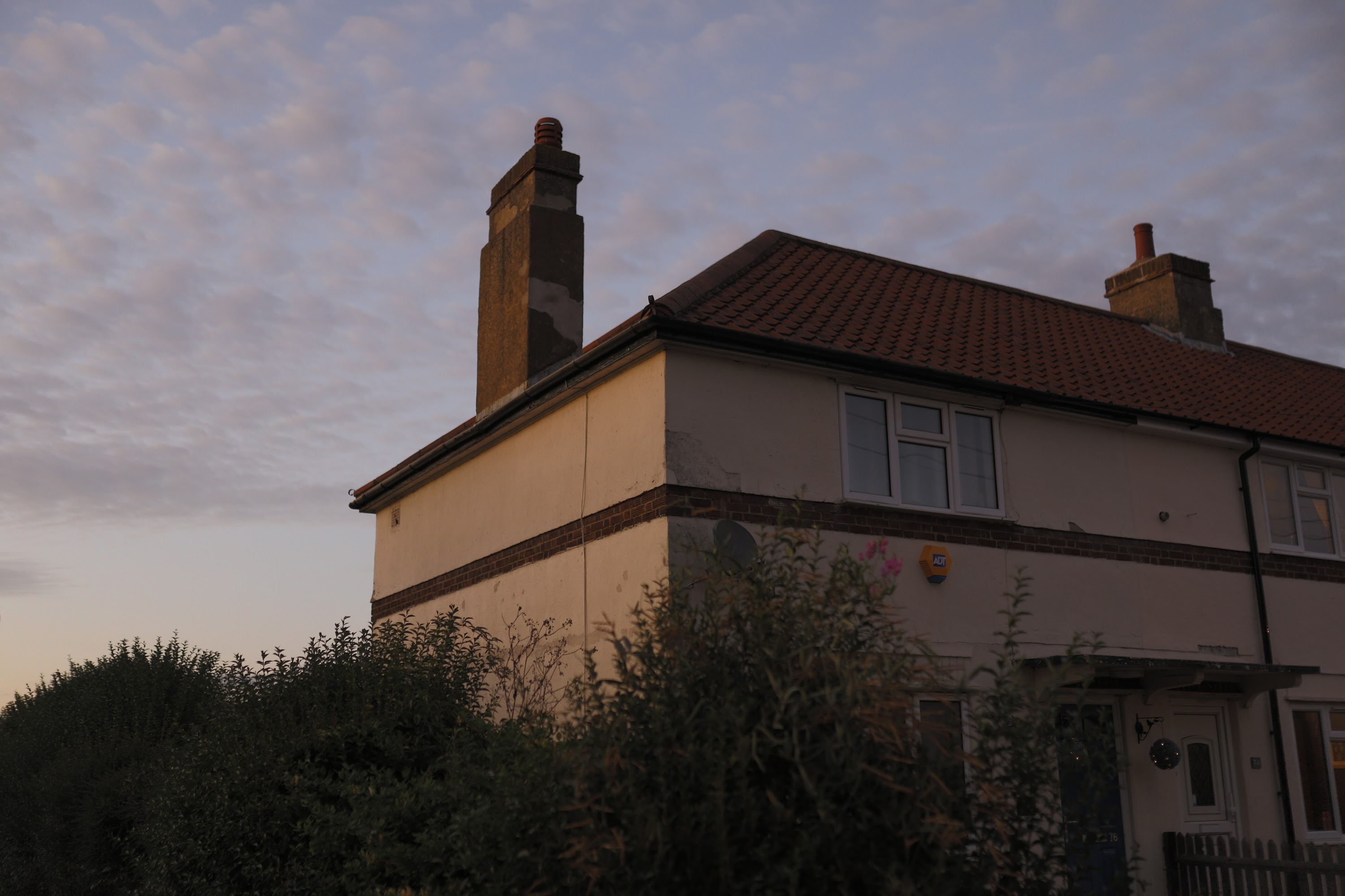 Twilight View of a Two-Story Terraced House