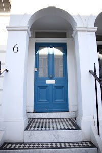 Blue Front Door of House Number 6