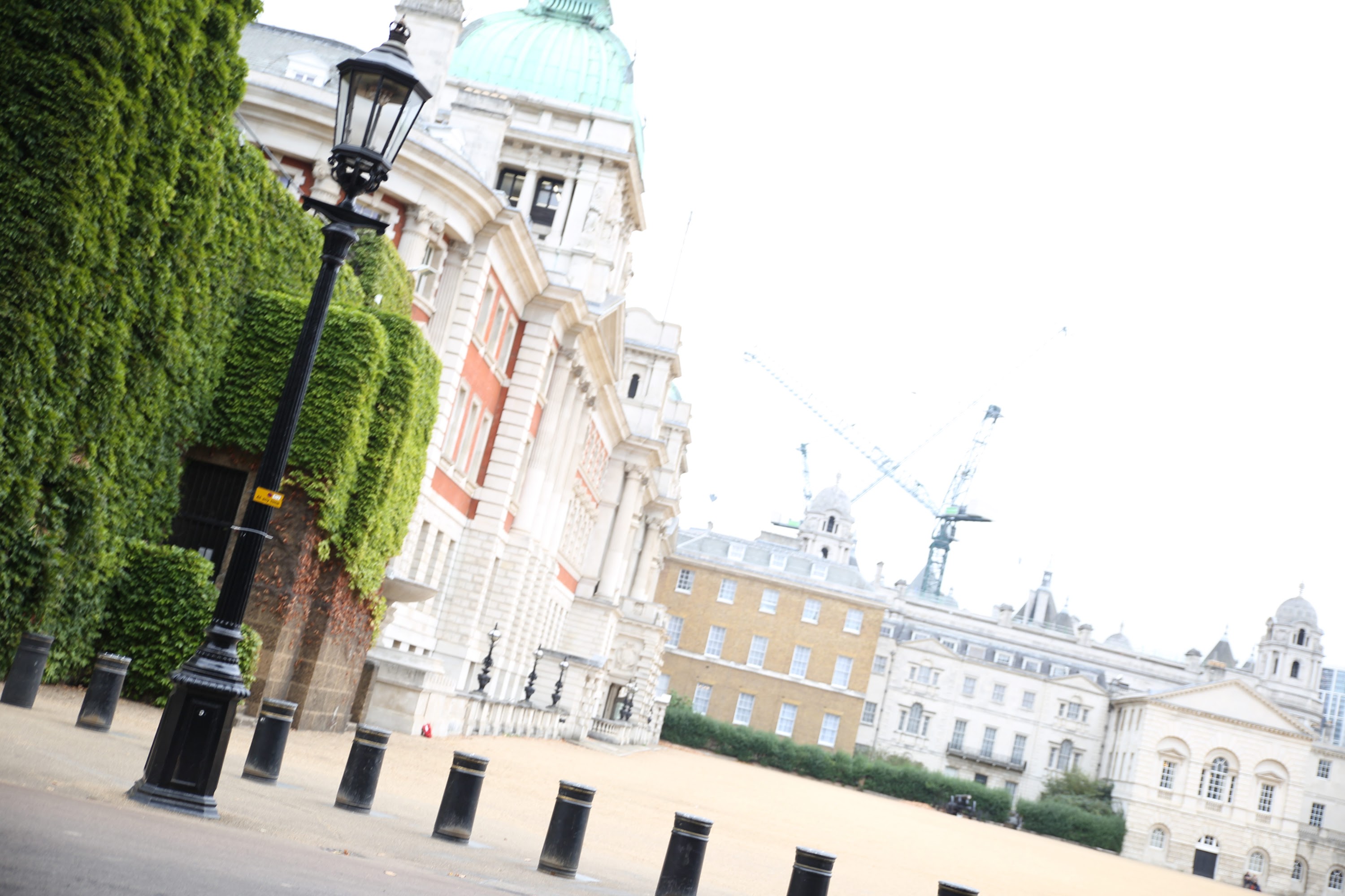 Historic London Building with Ivy and Street Lamp