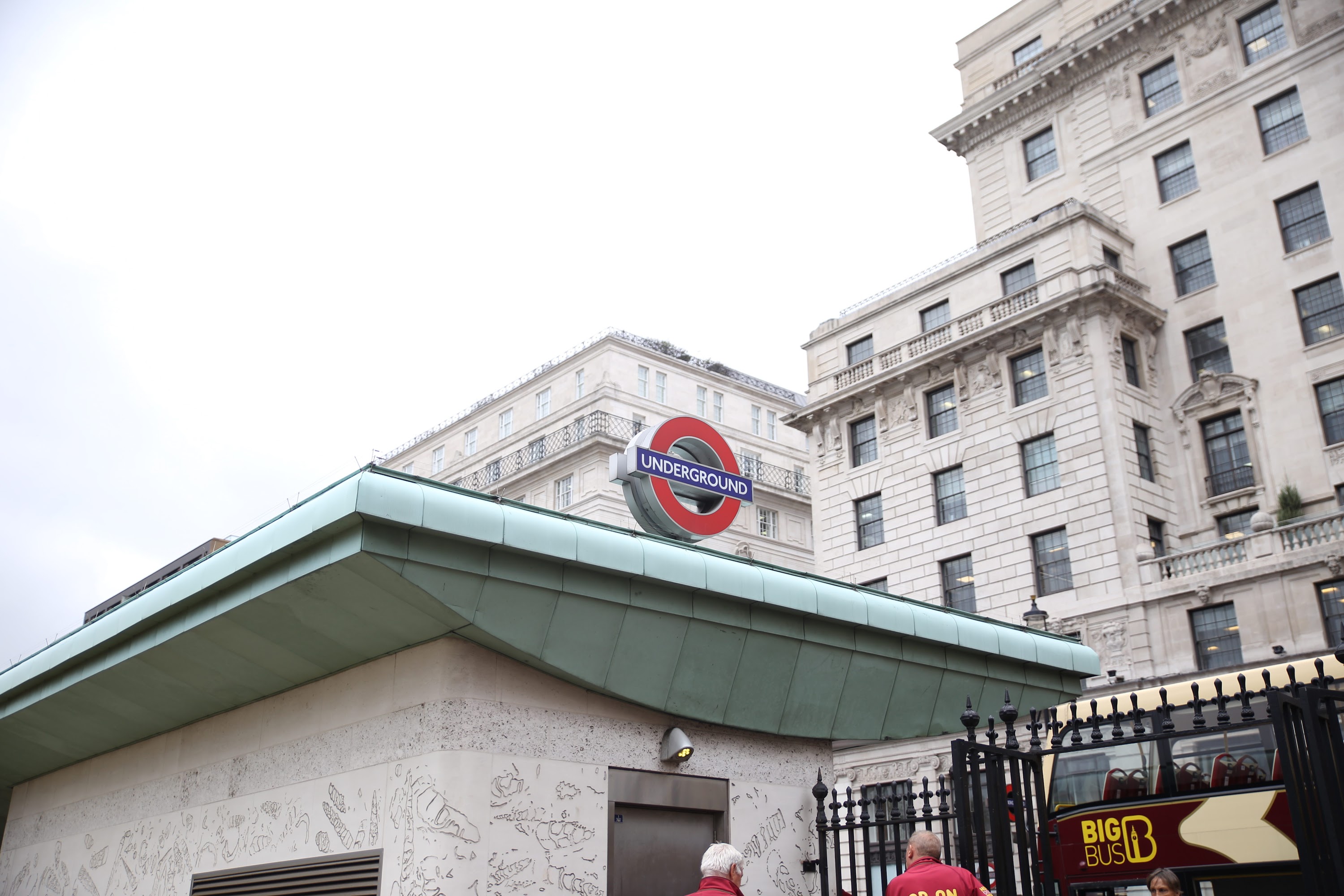 London Underground entrance with historic building backdrop