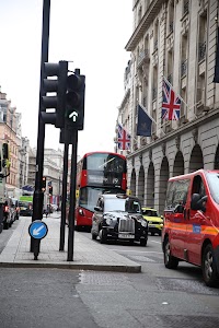 London Street Scene with Double-Decker Bus and Classic Taxi