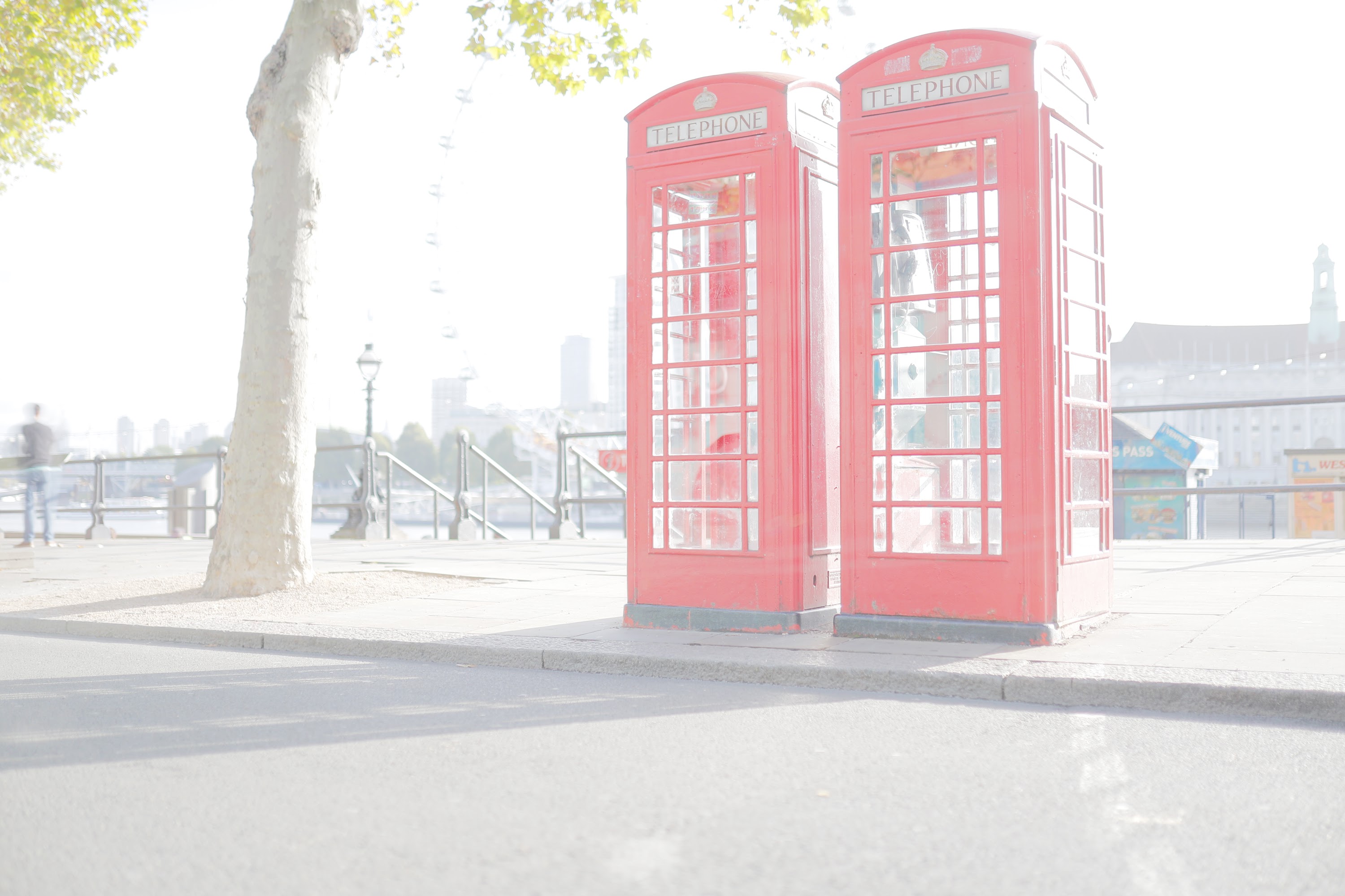 Red London Telephone Boxes by the River