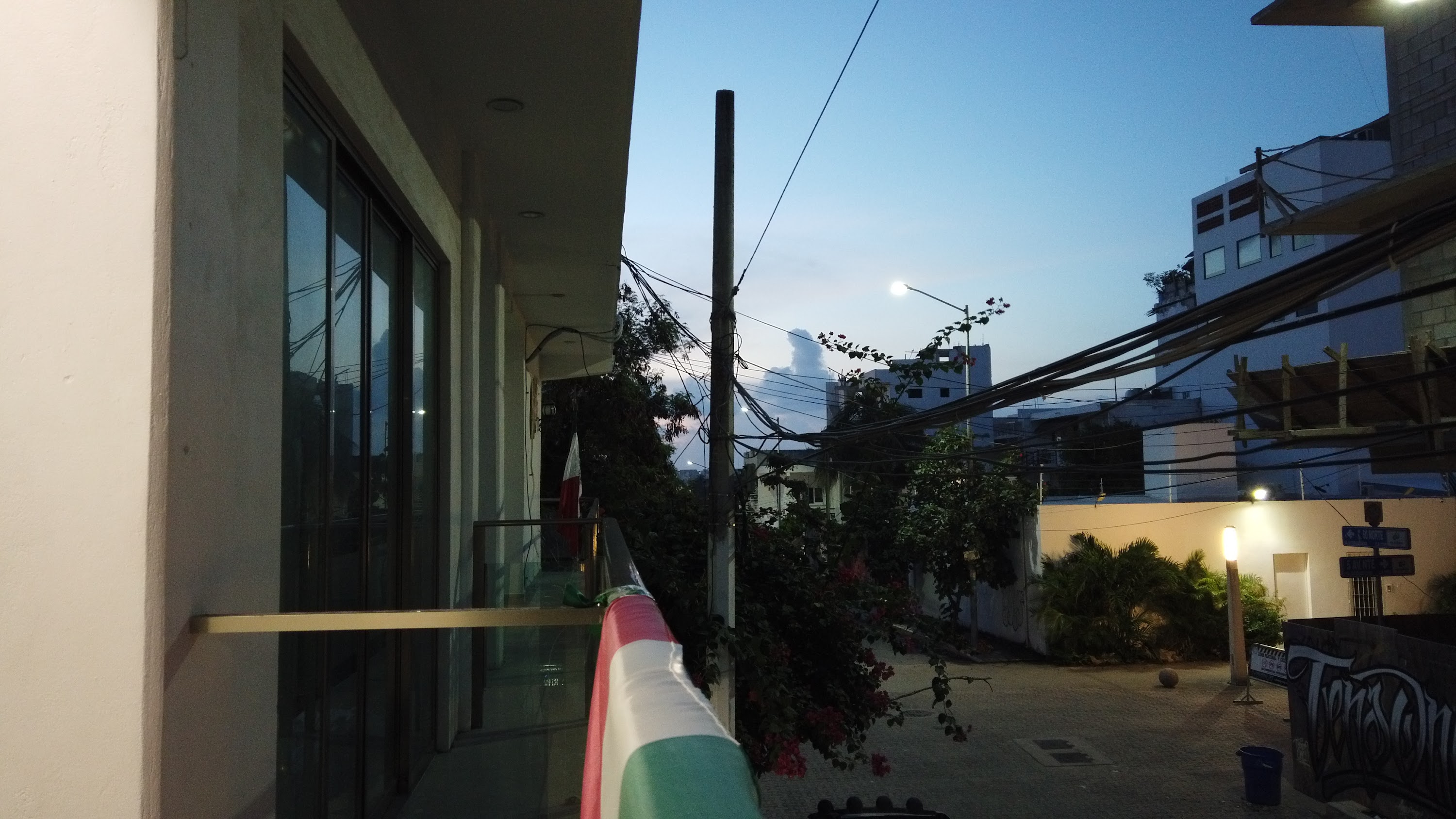 Multi-Story Concrete Building Under Construction at Dusk